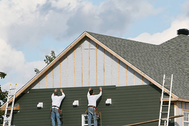 Professional Emergency Siding Repair technician working in Painesville, OH